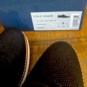 New in box Cole Haan black knit women’s shoe size 9.